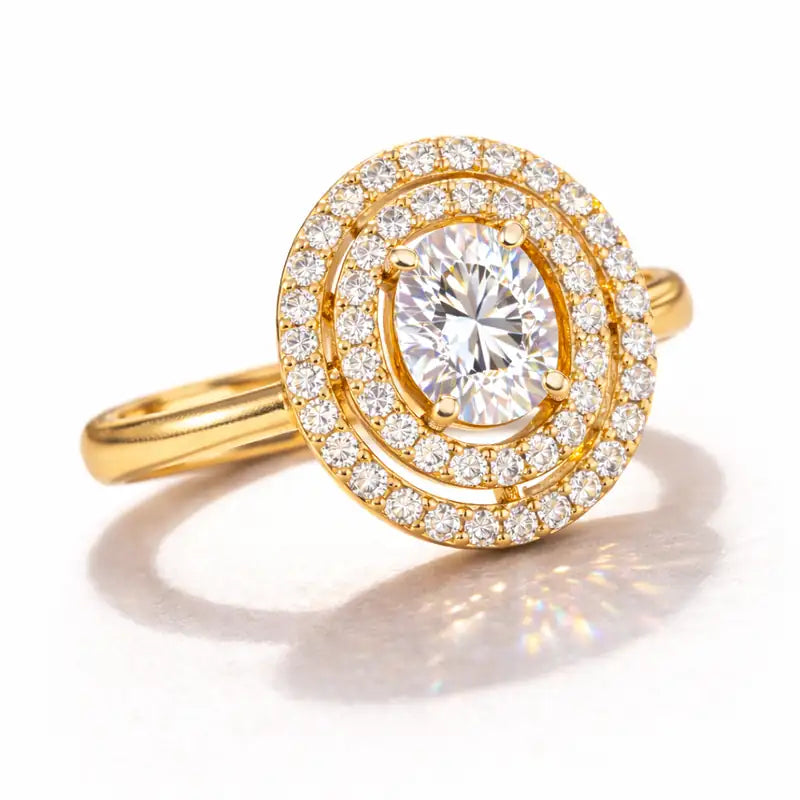 Gold ring with a large diamond and smaller diamonds on a white background